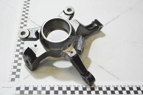 Кулак поворотний Авео перед лів (з ABS) GM 96870491
