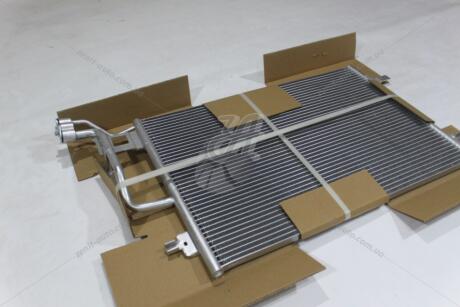Радиатор кондиционера VW Passat B5 (00-), Superb (01-) TANGUN 'P72209