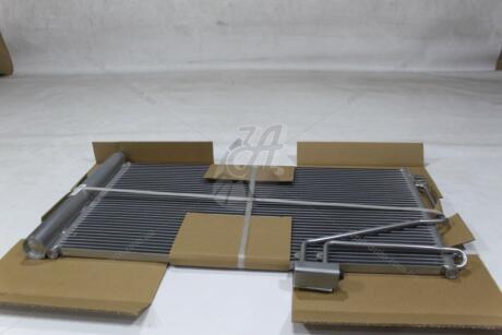 Радіатор кондиціонера MB C (W203) (00-) TANGUN 'P72249