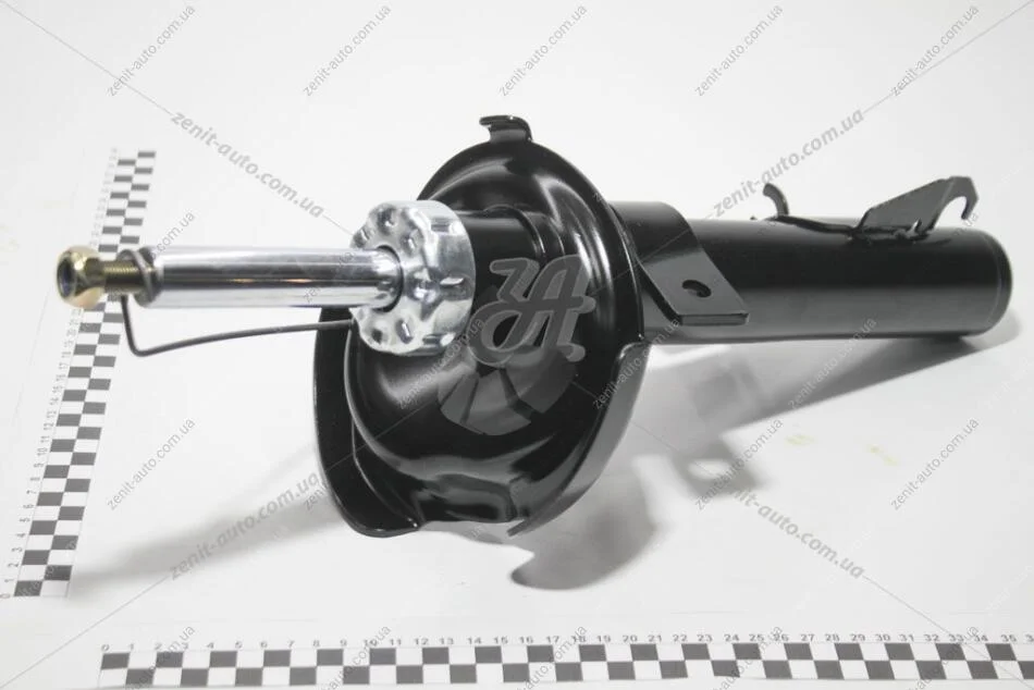 Амортизатор пер. лев. Mazda 3 (03-)/Mazda 3 (09-) Trialli AG 25150 (фото 1)