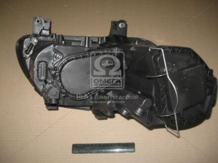 Фара левая VW Caddy (04-) с корректором TYC '20A760052B